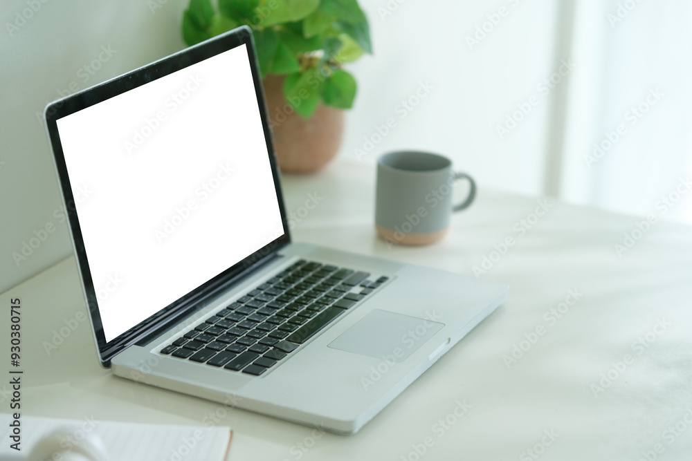 Fototapeta premium Workspace desk and laptop. copy space and blank screen.
