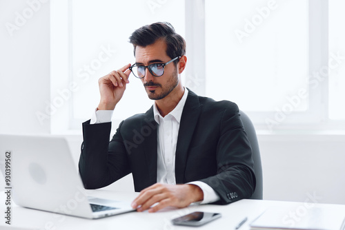 Working man internet glasses sitting business laptop tired desk office thinking