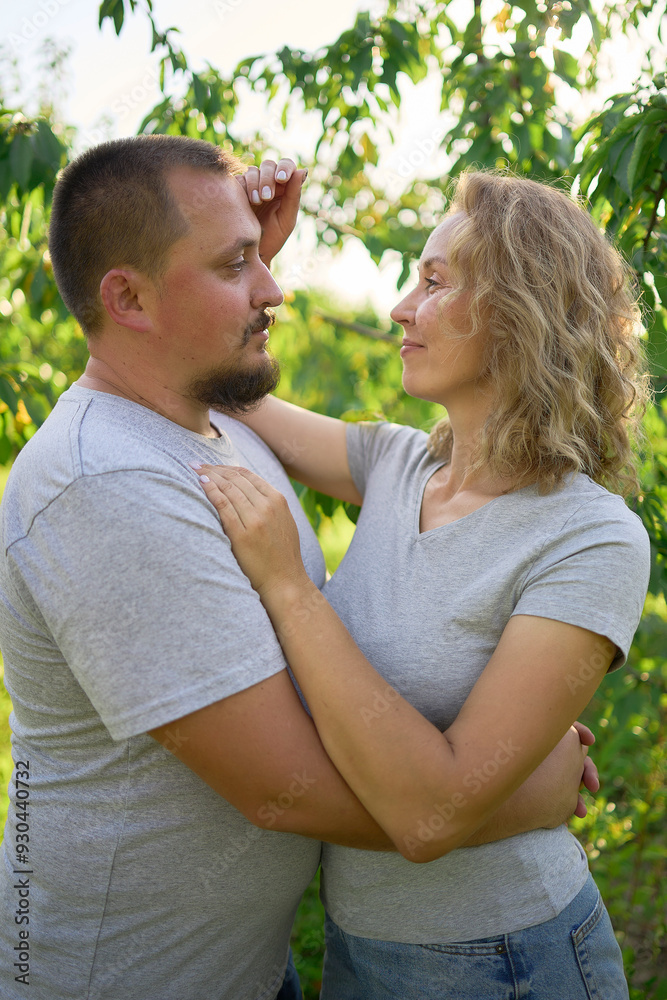 Fototapeta premium a middle-aged couple in love in the garden