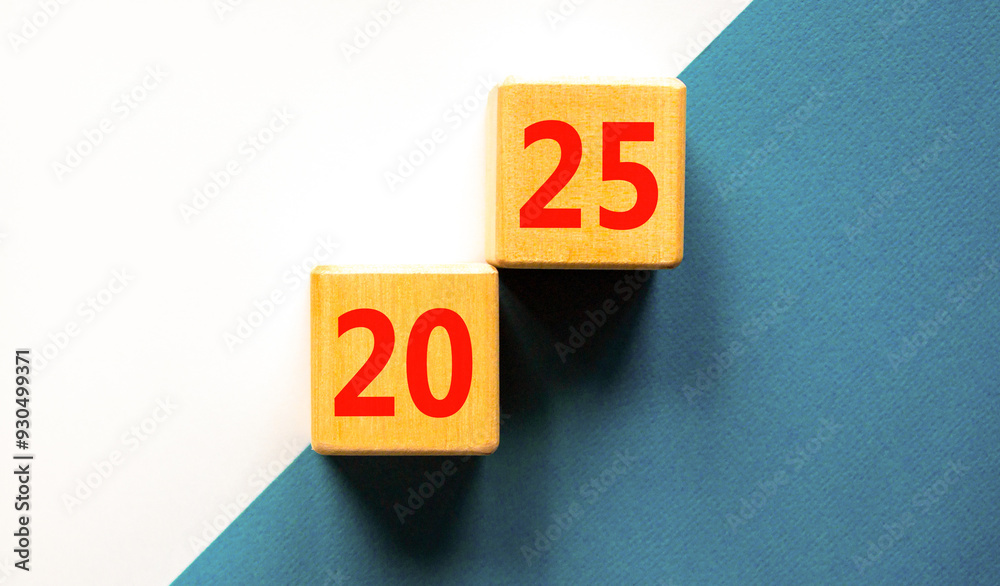 Business concept of 2025 new year symbol. Beautiful wooden cubes with number 2025 Happy new year. Beautiful blue and white white background, copy space. Business 2025 happy new year concept.