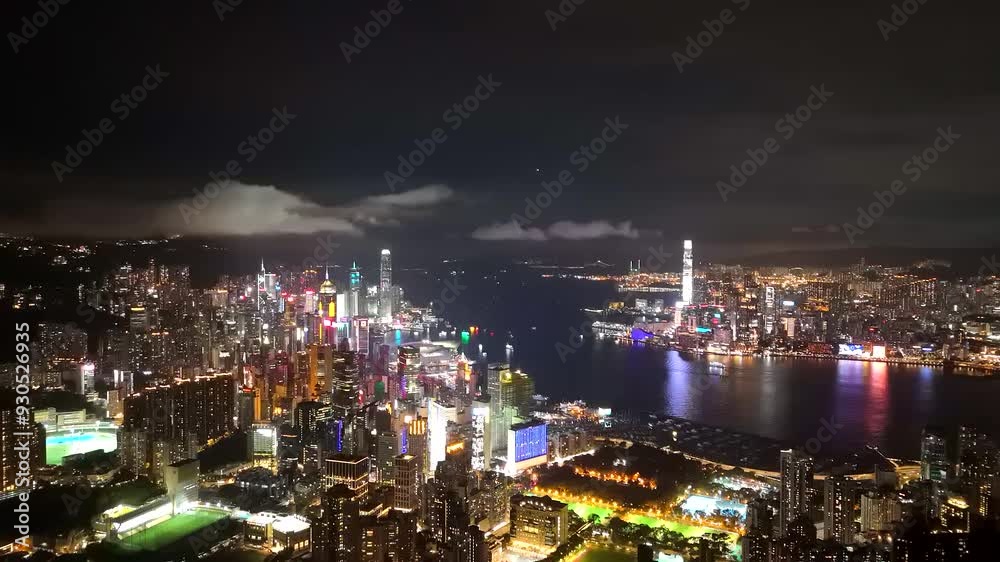 Hong Kong drone vdo aerial view. buildings cityscape city urban with light and transportation at Victoria Harbour and Kowloon at sunset along harbour Island. Hong Kong International Financial Centre. Hong Kong drone vdo aerial view. buildings cityscape city urban with light and transportation at Victoria Harbour and Kowloon at sunset along harbour Island. Hong Kong International Financial Centre.