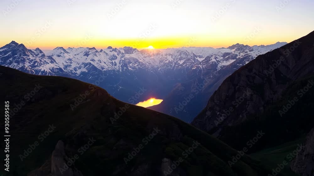 Sunrise over the snow-capped mountains in the Alps Sunrise over the snow-capped mountains in the Alps