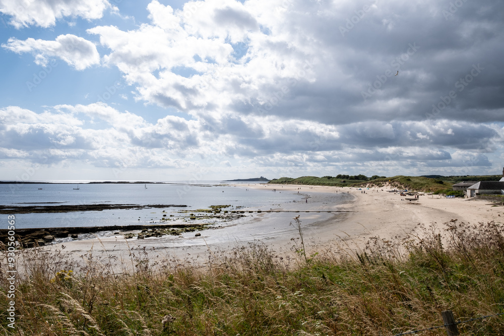Beach with rocks at one end in Northumbria Beach with rocks at one end in Northumbria