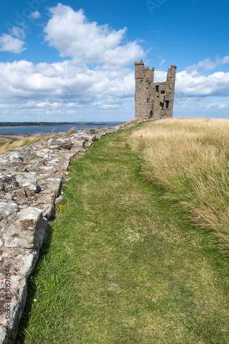 Ruined tower at Dunstanburgh in Northumbria photo