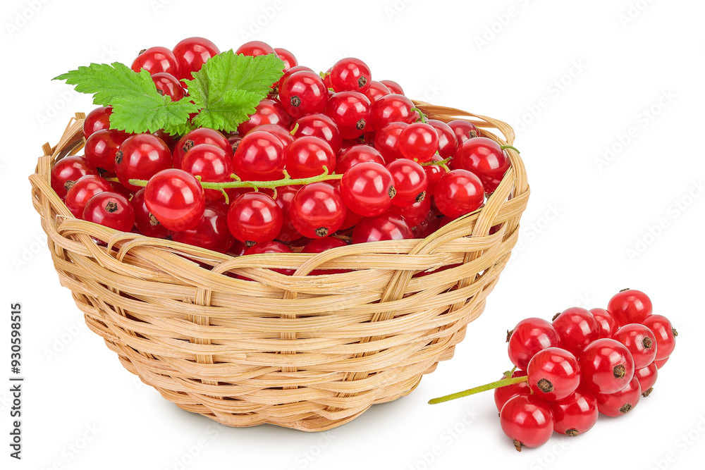 Red currant berries in a wicker basket with leaf isolated on white background Red currant berries in a wicker basket with leaf isolated on white background