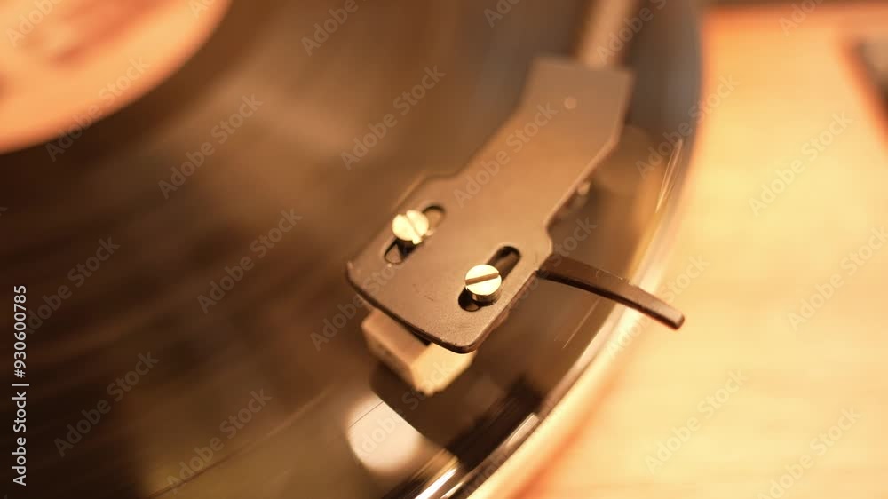 head of gramophone on spinning disc