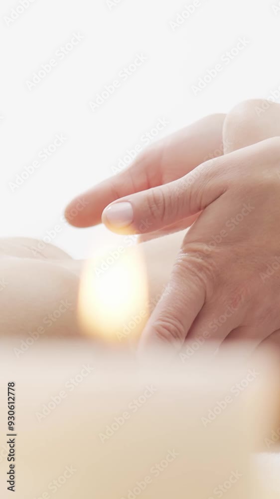 Woman is getting massage treatment from the therapist. Massaging procedure in spa. Healthcare, relaxation, rejuvenation and wellness concept. Woman is getting massage treatment from the therapist. Massaging procedure in spa. Healthcare, relaxation, rejuvenation and wellness concept.