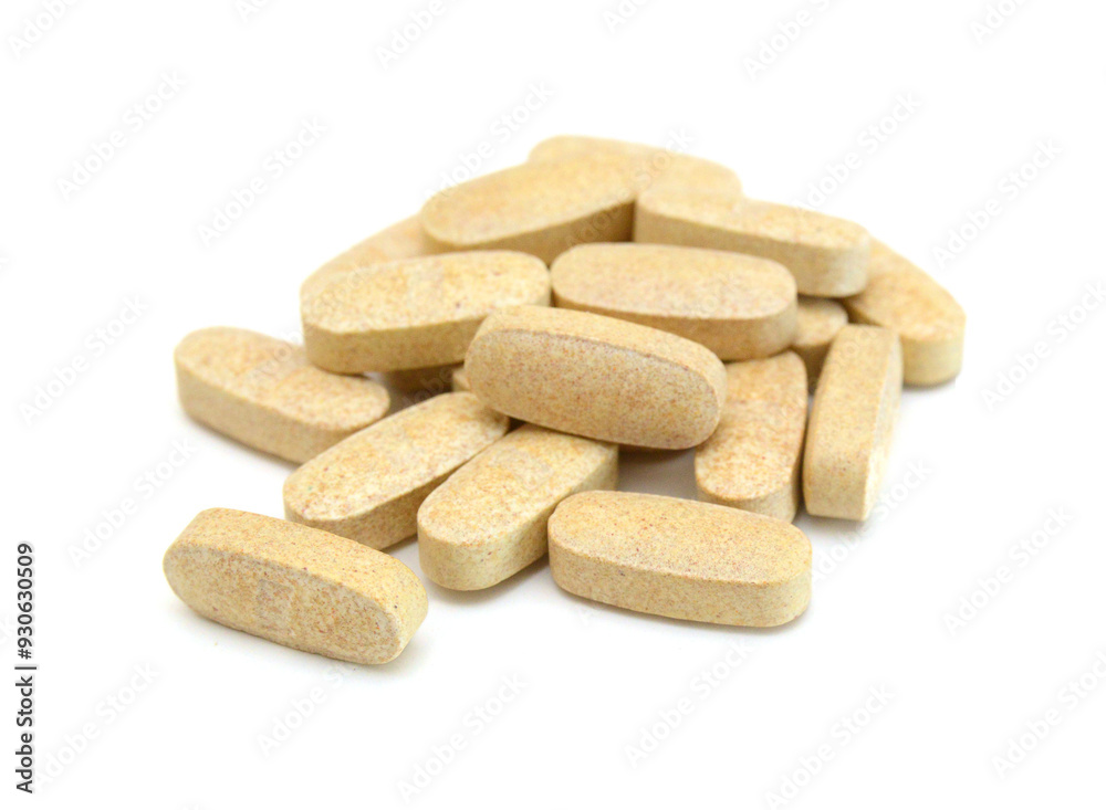 Yellow pills, medicine isolated on white background, top view Yellow pills, medicine isolated on white background, top view
