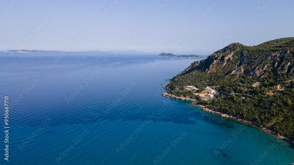 Isolated beautiful tropical island with white sand beach and blue clear water and granite stones. Top view, speedboats above coral reef. Isolated beautiful tropical island with white sand beach and blue clear water and granite stones. Top view, speedboats above coral reef.