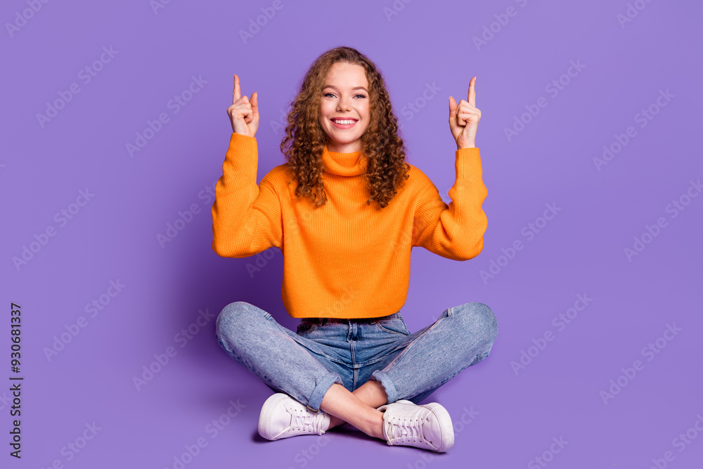 Full length portrait of lovely young girl direct fingers up empty space wear sweater isolated on purple color background Full length portrait of lovely young girl direct fingers up empty space wear sweater isolated on purple color background