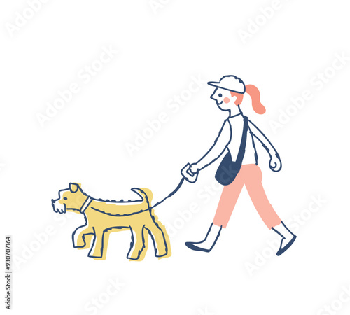 犬の散歩をしている女性