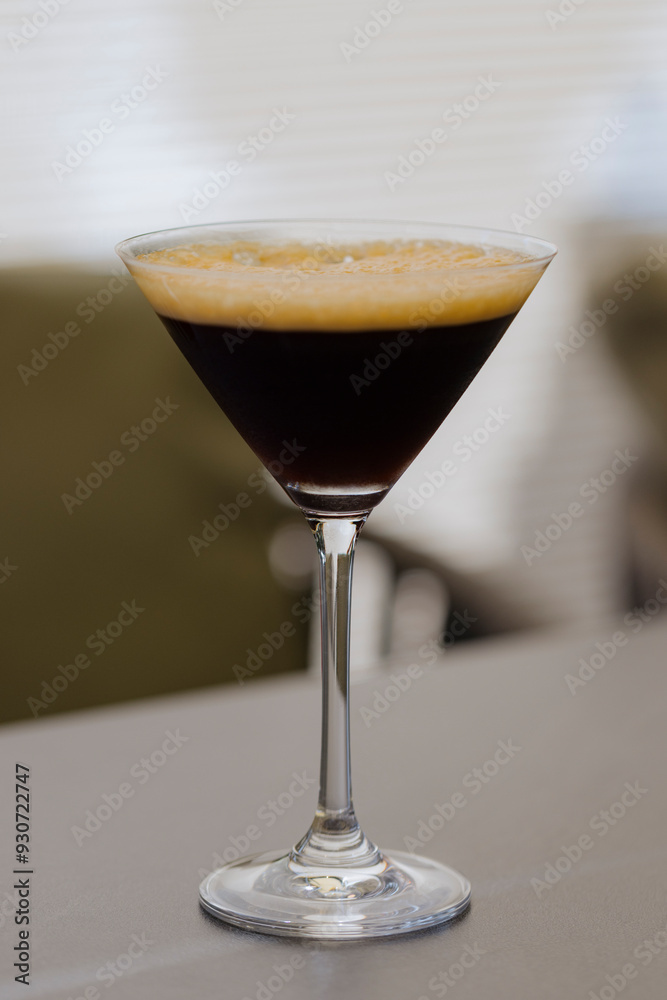 Espresso martini is a popular cocktail made with coffee, vodka and coffee liqueur, served in a martini glass Espresso martini is a popular cocktail made with coffee, vodka and coffee liqueur, served in a martini glass