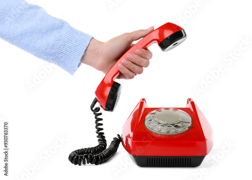 Woman using telephone on white background, closeup