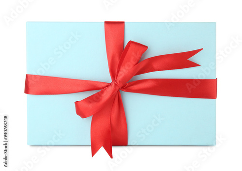 Gift box with red satin bow isolated on white