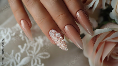 Elegant wedding manicure with nail design photo