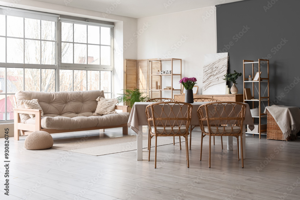 Fototapeta premium Interior of room with dining table and sofa