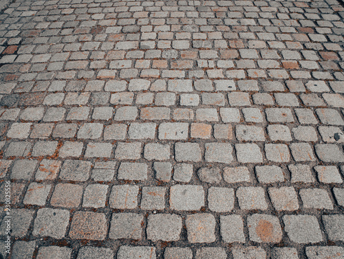 Cobblestone pavement background. Textured background of cobblestone road. Cobblestone pavement for background. Cobblestone road background.