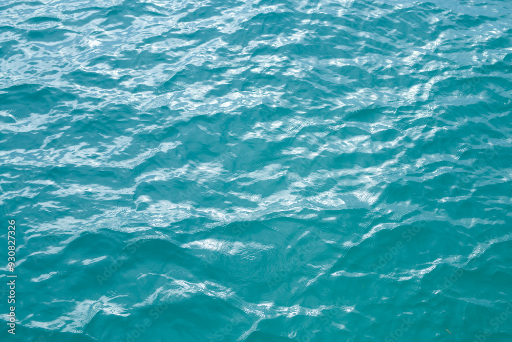 Ocean water surface. Water texture. Sea surface. Blue turquoise sea water background. Background of aqua sea water surface. Ocean water surface. Water texture. Sea surface. Blue turquoise sea water background. Background of aqua sea water surface.