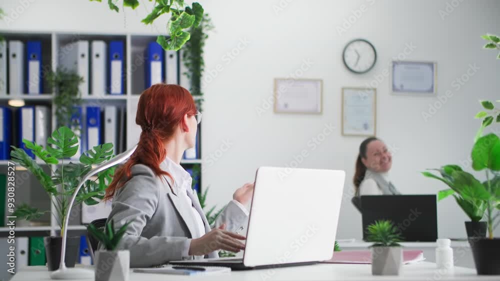 working day, busy young female employee is outraged by colleagues idleness during working hours in office working day, busy young female employee is outraged by colleagues idleness during working hours in office