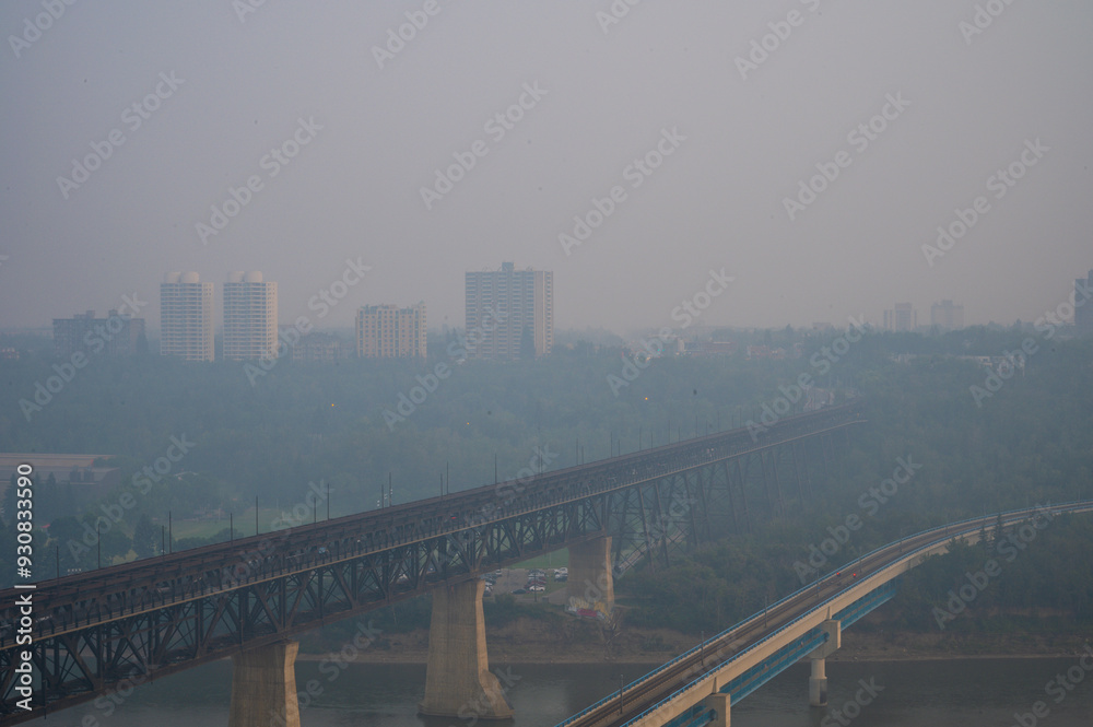 Obraz premium bridge over the river in smoke