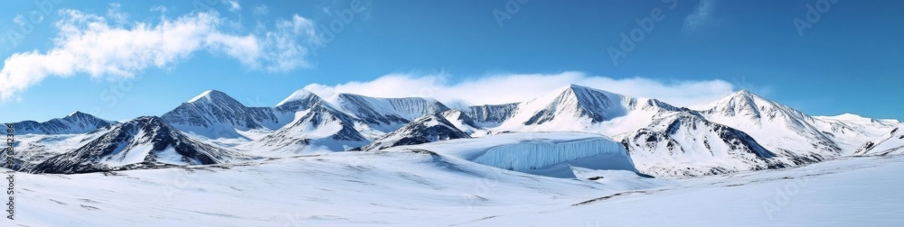 Snow-covered mountain panorama with towering peaks, blue sky, and ice wall with rocks. Vast and detailed snowy landscape. Snow-covered mountain panorama with towering peaks, blue sky, and ice wall with rocks. Vast and detailed snowy landscape.