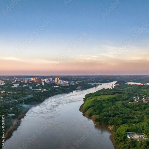 Border between Brazil and Paraguay and connects Foz do Iguacu to Ciudad del Este. Ponte da Amizade in Foz do Iguacu. Aerial view of the Friendship Bridge with Parana river.