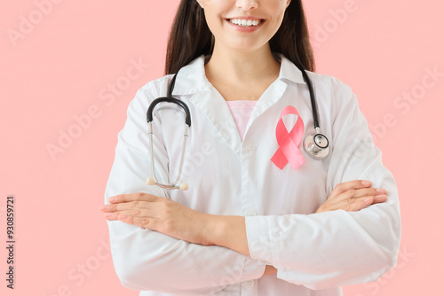 Female doctor with pink rib...