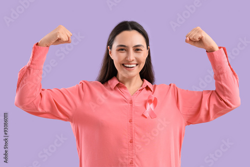 Happy young woman with pink...
