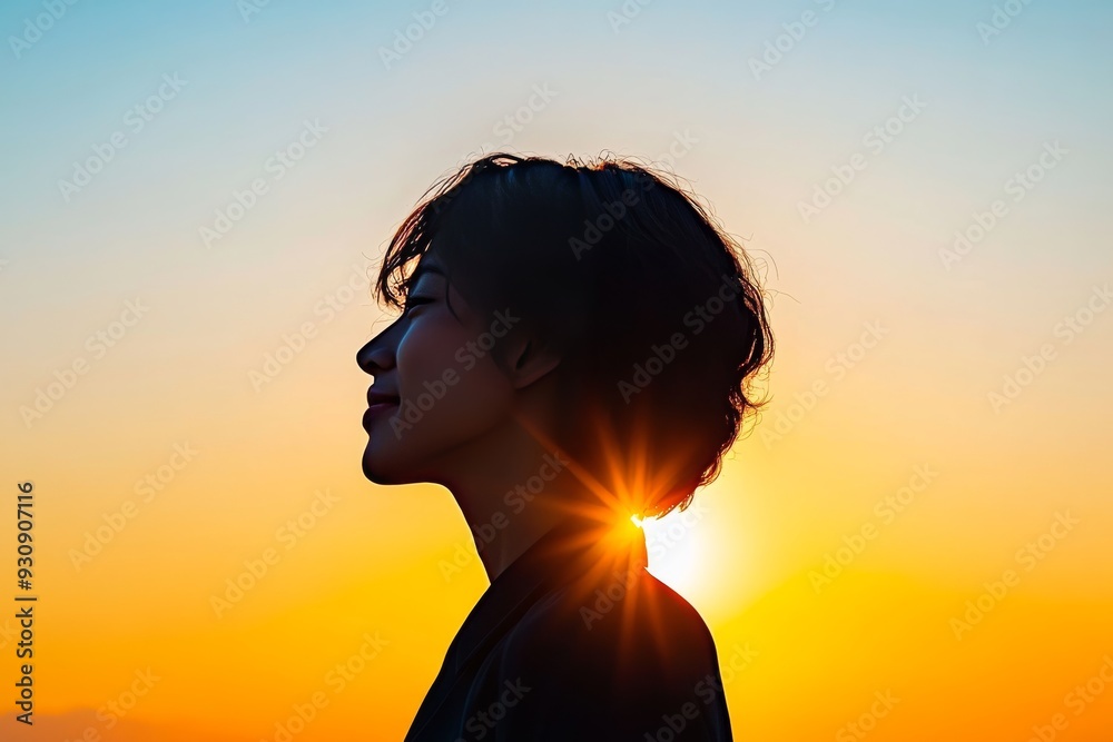 Silhouette of a thoughtful person with a glowing brain against a sunset backdrop symbolizing the deep connection between nature thought and inner peace in a serene contemplative scene
