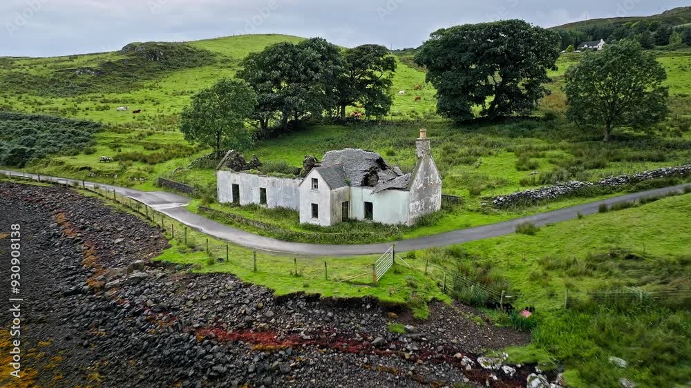 Aerial view of Scottish houses on the Isle of Skye. Old building on the highlands of Scotland. Aerial view of Scottish houses on the Isle of Skye. Old building on the highlands of Scotland.