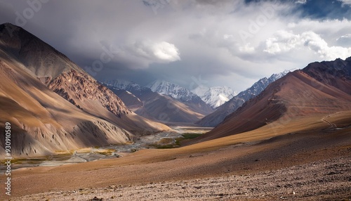 moody high altitude mountain landscape with muted colors on the pamir highway near ak baital pass murghab district gorno badakhshan tajikistan photo