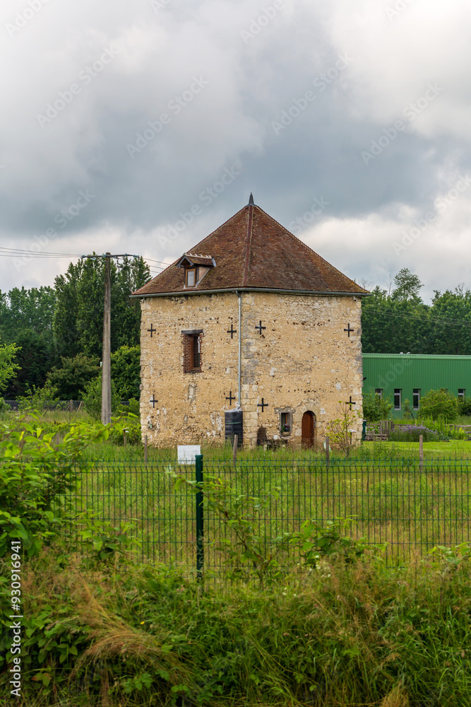 Fototapeta premium Rustic Stone Tower House in French Countryside