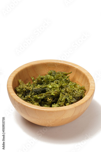 Crispy fried seaweed coated in flour, harvested from the southern beaches of Yogyakarta, photographed against a white background.