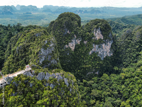 Iconic karst landscape in Krabi next to the Tiger Cave Temple, with limestone mountains and cliffs, Thailand