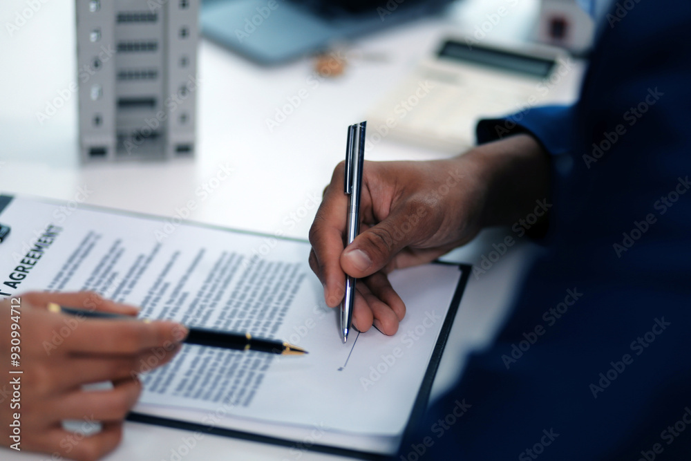 Fototapeta premium Sale representative offer house purchase contract to buy a house or apartment or discussing about loans and interest rates