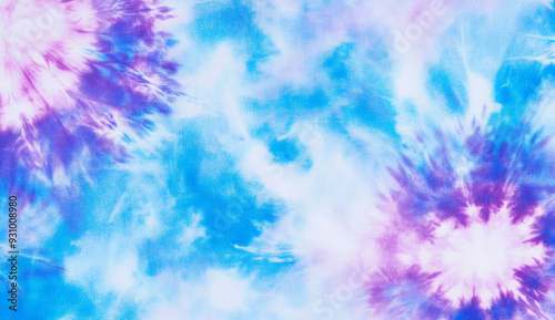 Abstract tie dye background in blue and purple.