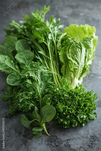 Bunch fresh green leafy vegetables dark grey textured Fresh gree