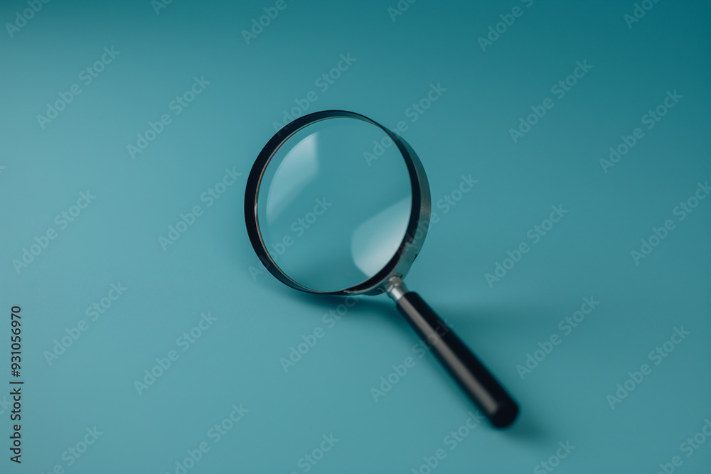 Magnifying Glass on Blue Background Magnifying Glass on Blue Background