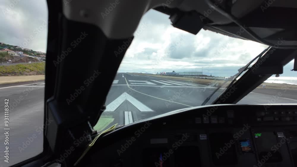 Immersive pilot POV from inside a jet cockpit stating the takeoff roll from Funchal Airport in Madeira Island (Portugal), at the eyes of the the pilots. 4K 60FPS Immersive pilot POV from inside a jet cockpit stating the takeoff roll from Funchal Airport in Madeira Island (Portugal), at the eyes of the the pilots. 4K 60FPS