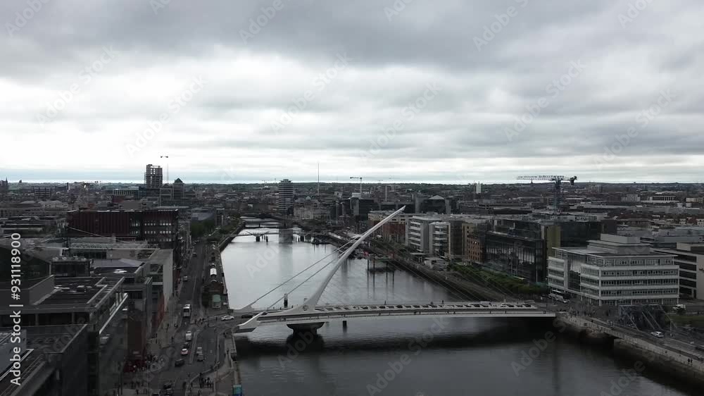 Dolly drone shot over Dublin city by the river Liffey moving forwards with Liberty Hall Samuel Beckett and IFSC International Financial Services Centre. Dolly drone shot over Dublin city by the river Liffey moving forwards with Liberty Hall Samuel Beckett and IFSC International Financial Services Centre.