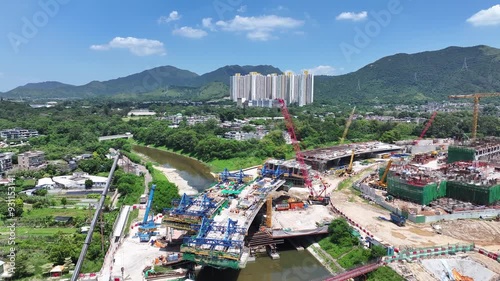 Construction of Hong Kong Fanling Bypass, a vital road transportation infrastructure connecting Northern Metropolis, utilizing innovative concrete steel components expected to build highway flyover photo