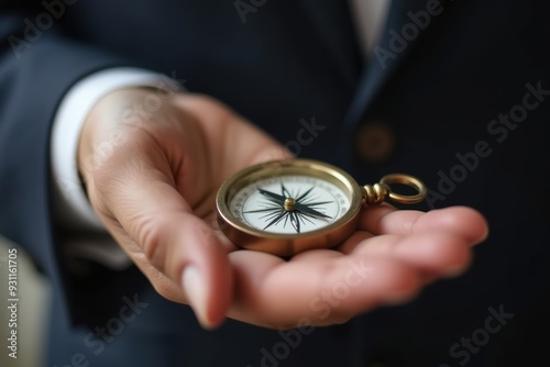 Businessman's hand holding a compass, Business direction. Generative AI