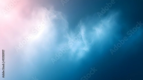 Abstract cloud formation in soft blue and pink hues.