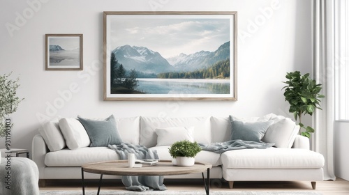 White Sofa and Coffee Table with Framed Mountain Lake Landscape