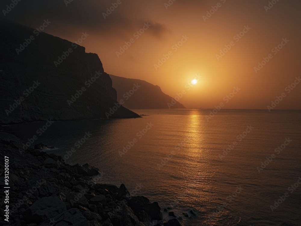 An orange-hued seascape at sunset, capturing the tranquil beauty of the moment and the gentle waves lapping at the shore. An orange-hued seascape at sunset, capturing the tranquil beauty of the moment and the gentle waves lapping at the shore.