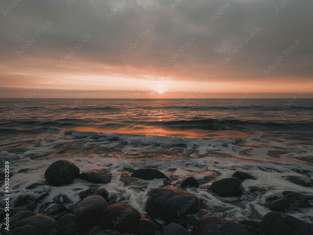 A picturesque scene of coastal rocks and seascape beneath an orange sky, highlighting the tranquility and stunning beauty of nature. A picturesque scene of coastal rocks and seascape beneath an orange sky, highlighting the tranquility and stunning beauty of nature.