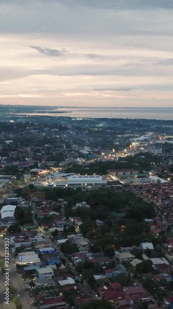 Highway in Cagayan de Oro at dusk. Mindanao, Philippines. Cityscape. Vertical video. Highway in Cagayan de Oro at dusk. Mindanao, Philippines. Cityscape. Vertical video.