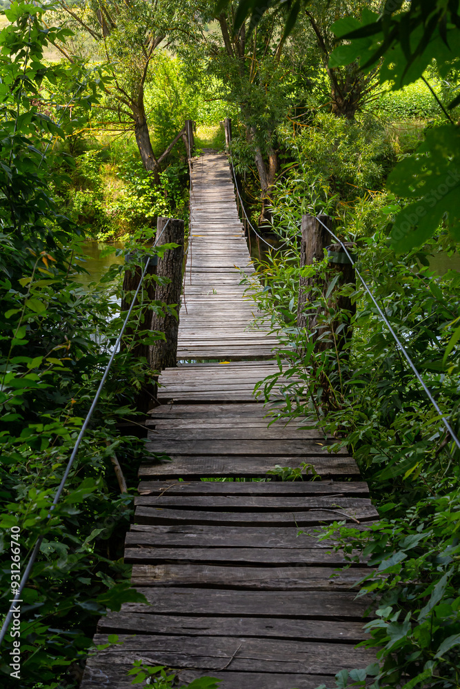 Suspension bridge, walkway to the adventurous, cross to the other side Suspension bridge, walkway to the adventurous, cross to the other side