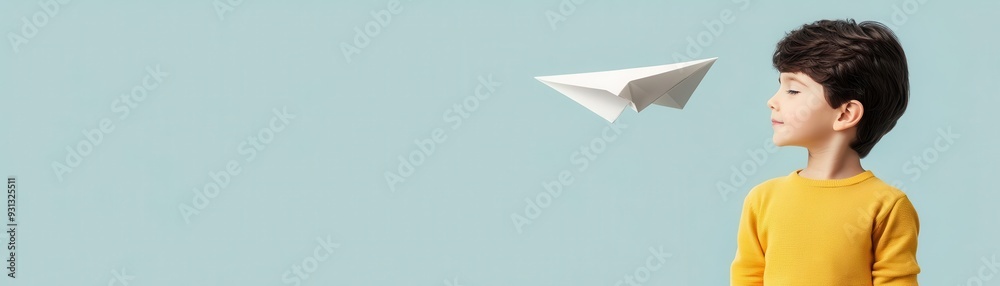 Little boy dreaming of being a pilot, flying paper airplanes, flat design illustration Little boy dreaming of being a pilot, flying paper airplanes, flat design illustration