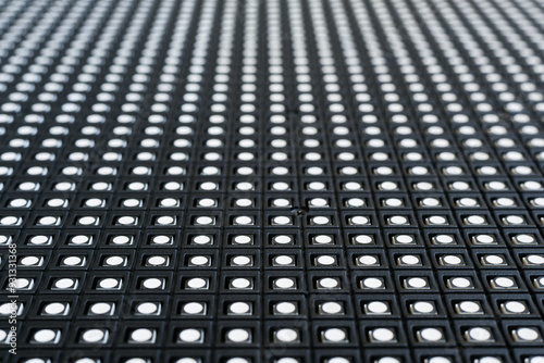 Selective focusing of LEDs on the surface of an LED screen module close-up
